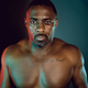 Illustration for article titled Idris Elba Is in a State of Undress on the Cover of emDetails/em